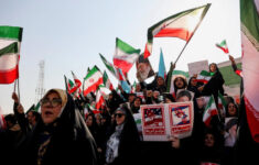 Warga Iran menghadiri unjuk rasa pro-pemerintah di Teheran, Iran, Senin (12/1/2026). Dok: Eranasional/HO Stringer/REUTERS.